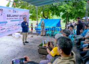 Bank Mandiri Bersama FWE NTB Tebar Sejuta Benih Ikan di Bendungan Meninting